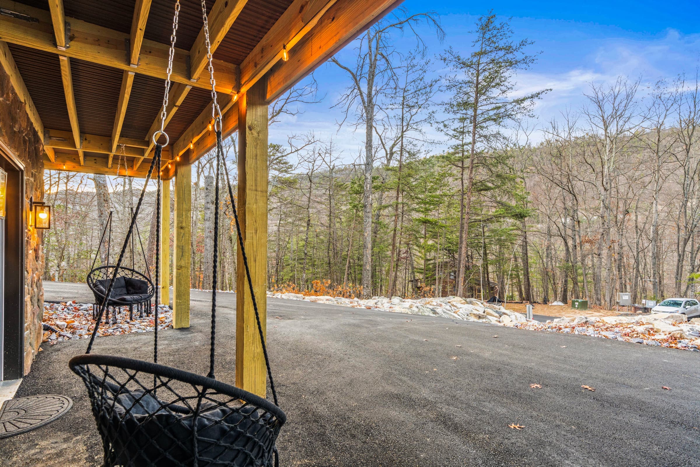 Covered porch with swing chairs